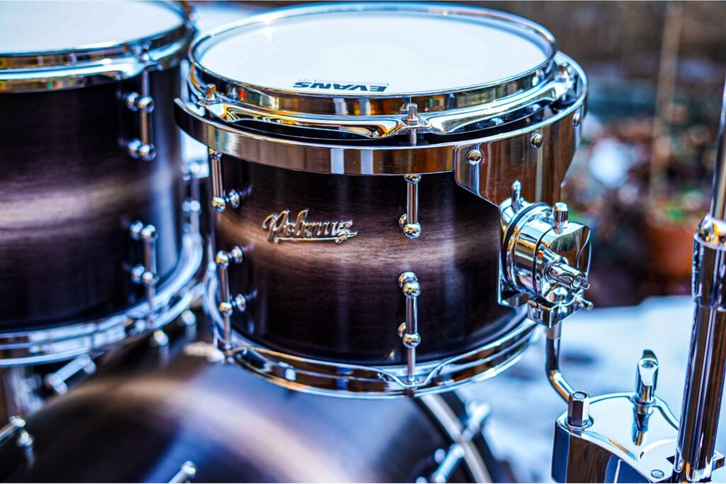 Tom Polmuz Model 1 w czarnym fade z naciągiem Evans